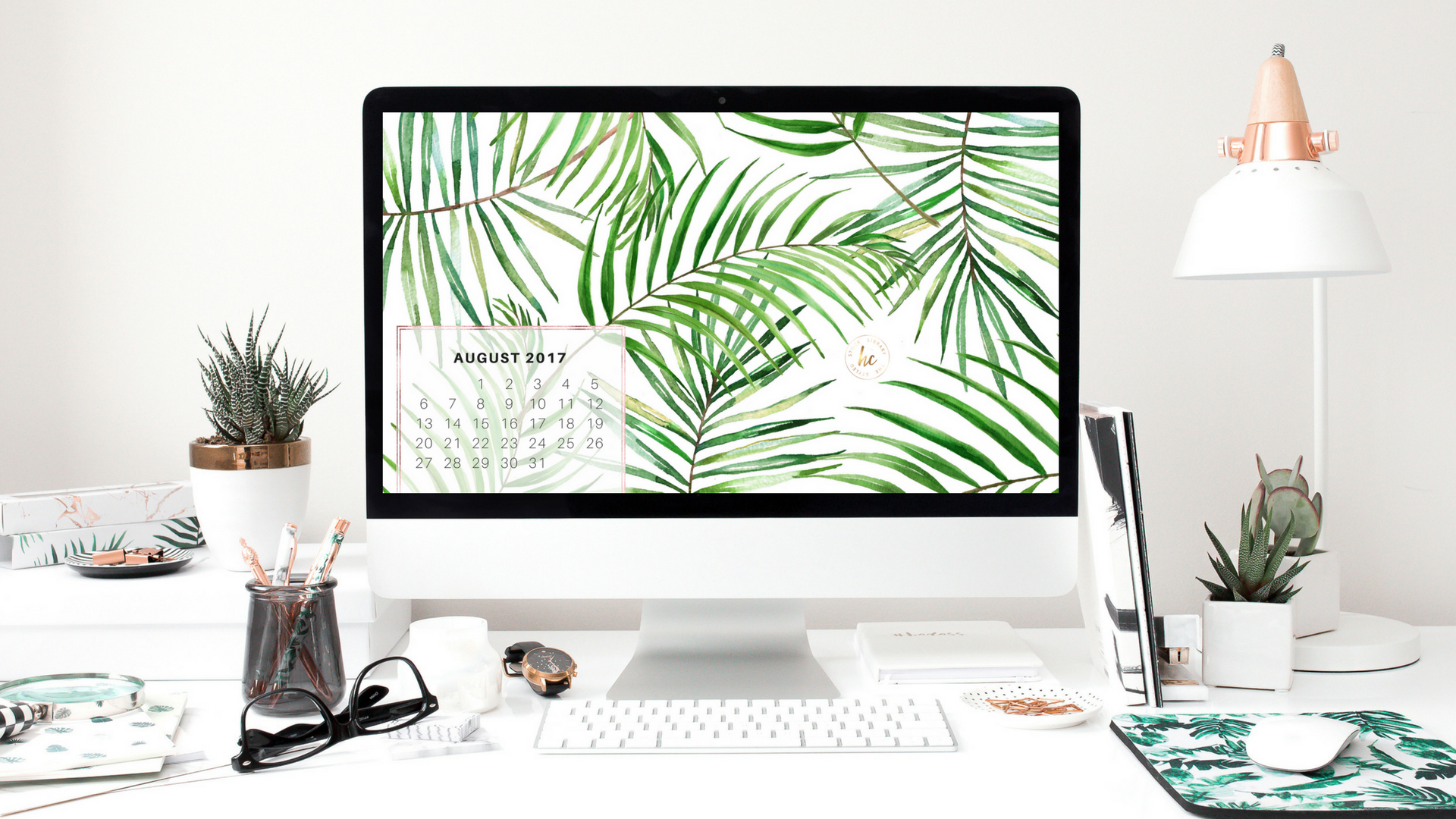  Need a wallpaper for your desktop or laptop? Stay on track with a stylish monthly wallpaper graphic. We designed this in Canva, using a background from our Tropical Graphic Pack.  *Please note that you cannot create products, like wallpapers, that u