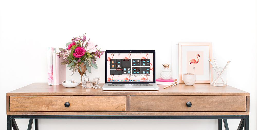  Another genius example from Leah Remillét — she added her flamingo print to the frame mockup, as well as her matching downloadable digital wallpaper on the laptop, to truly customize this styled desktop.&nbsp; 