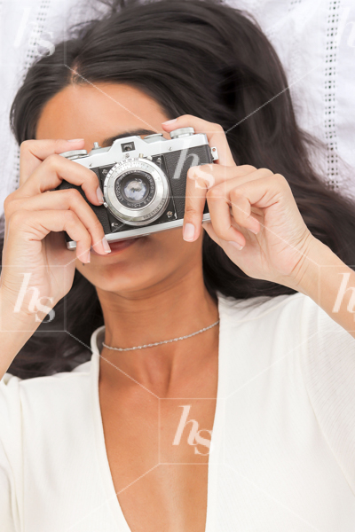 Seasonal Lifestyle Stock Photos like this one of a woman taking a picture.