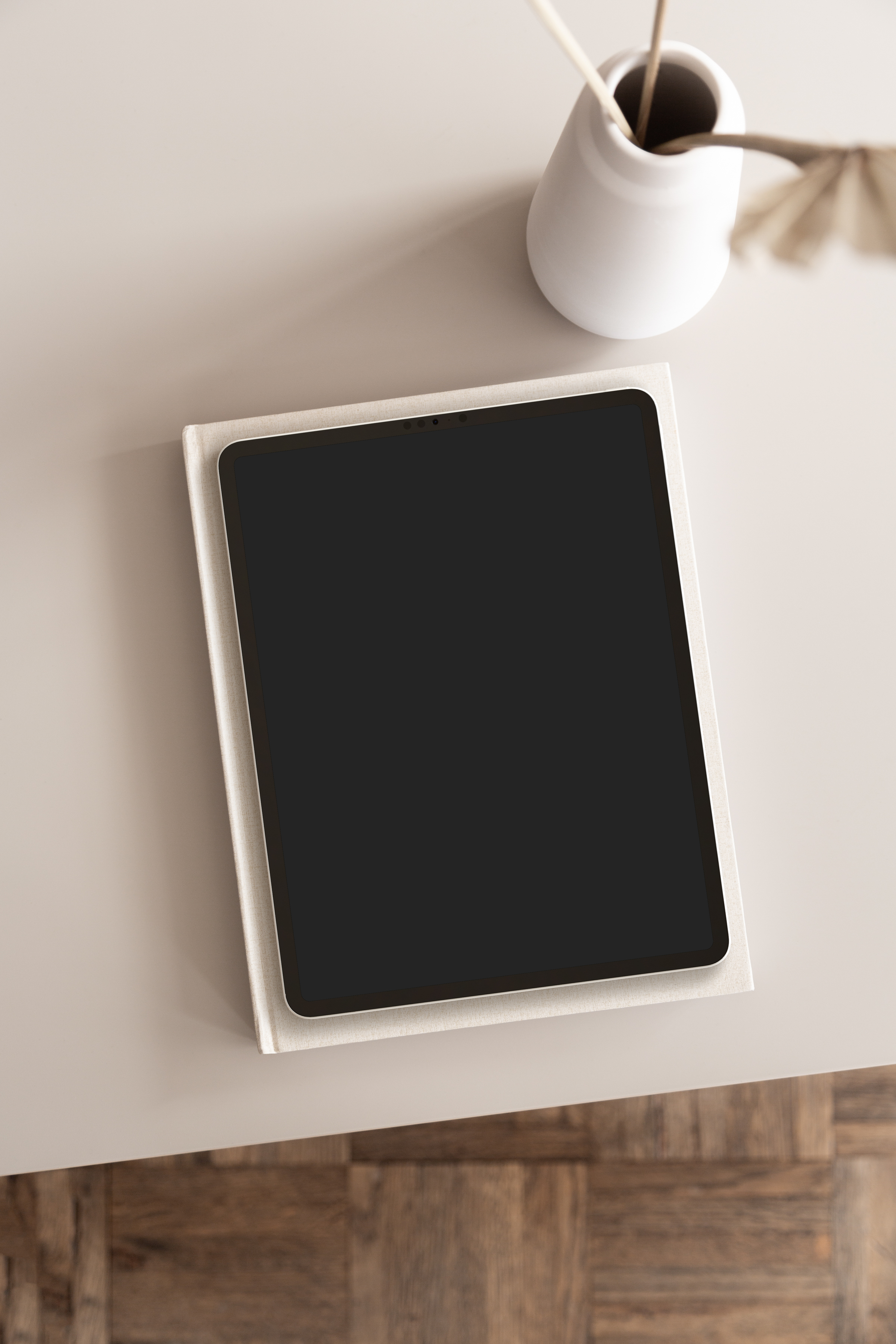 Flatlay of black blank iPad screen perfect to display your designs