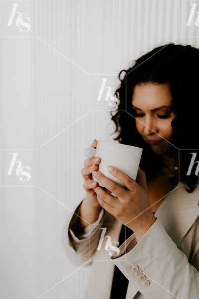 Styled stock photo of woman relaxing with a coffee mug