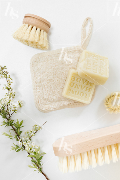 Hand made soap and fresh cleaning supplies, a stock image for conscious women home organizers 