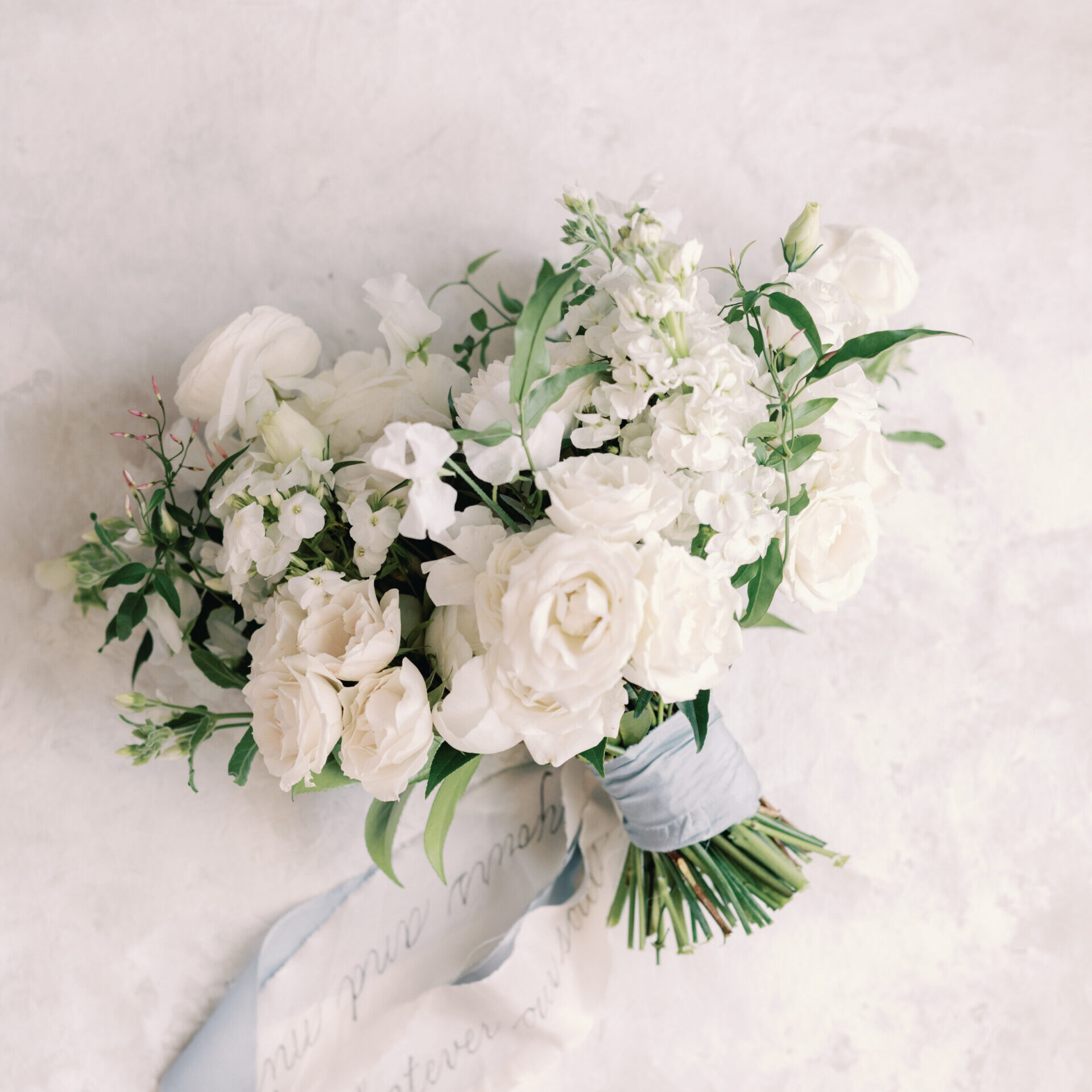 Bridal flower bouquet flatlay, a stock image for wedding planners and florists.