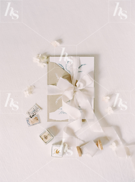 minimalist stock image of wedding invitations flatlay