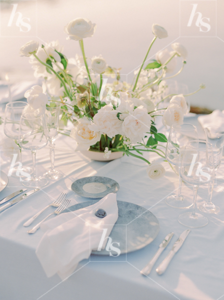 Plate setting at wedding reception table, a stock image perfect for wedding and event planners