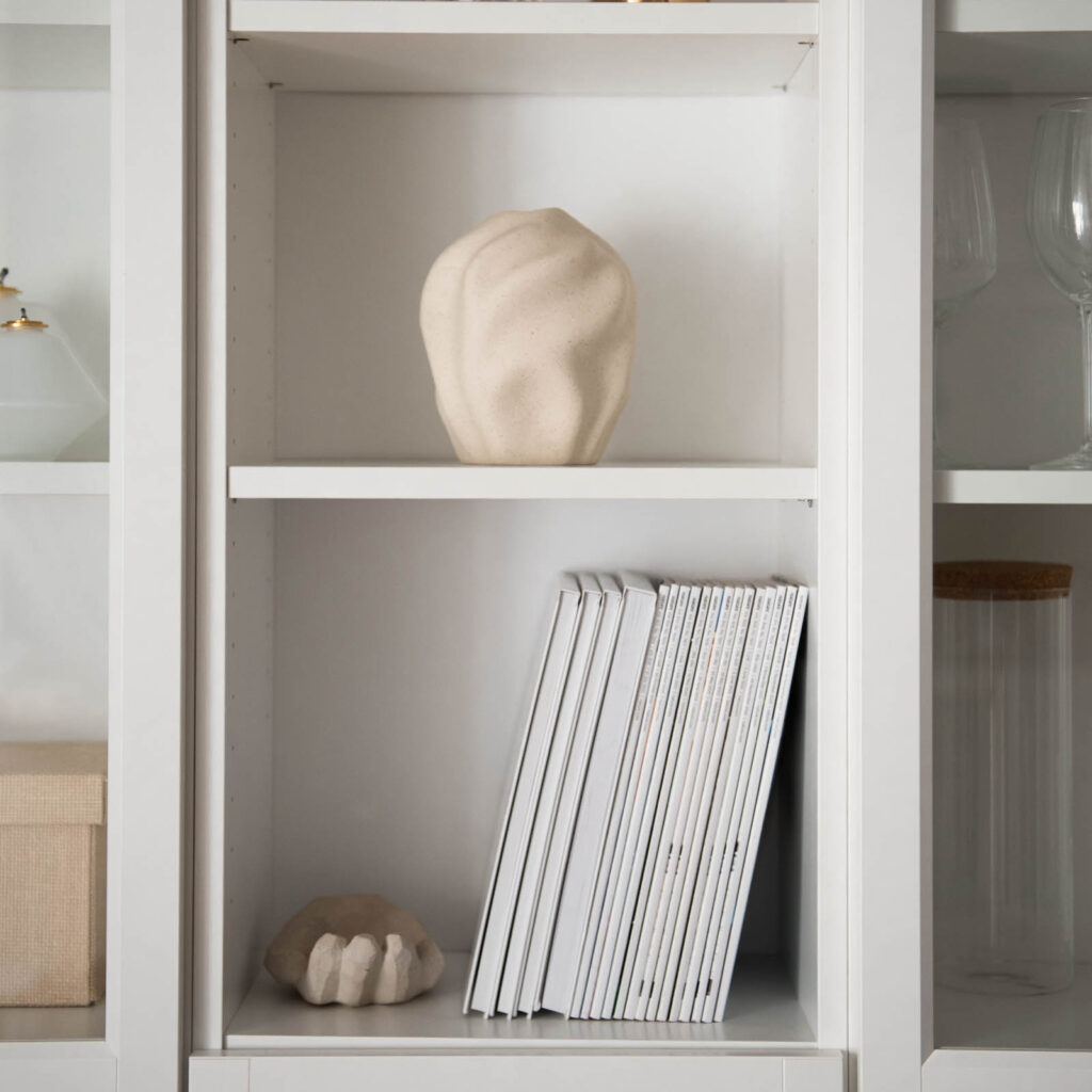 Cozy study showcasing a built in bookshelf with books and home decor, perfect stock image for interior designers.