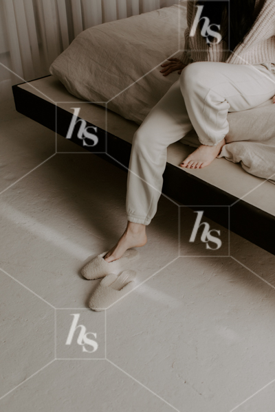 Woman sliding into slippers from bed, part of Daily Habits wellness & lifestyle stock images collection perfect to elevate your wellness brand!