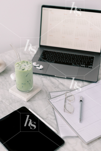 All the workday essentials set up for a day of scheduling and planning, part of Matcha Time: green workspace stock photos & videos collection