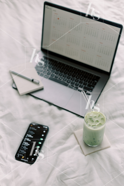 Working from bed with matcha tea and laptop, part of Matcha Time: green workspace stock photos & videos collection