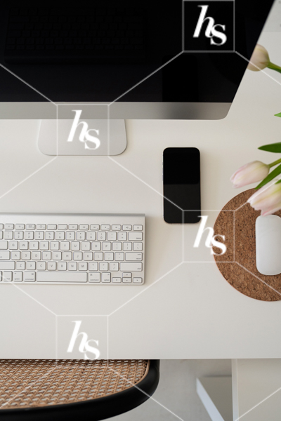 Flatlay of desk with computer, keyboard, and phone, part of a collection of interior-inspired stock photos for creative studios, designers, and lifestyle brands.