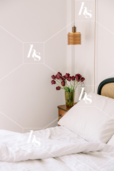 Bright, clean bedroom with soft natural light and minimal decor. Wellness stock photos for self-care content, lifestyle blogs, and interior-focused brands.