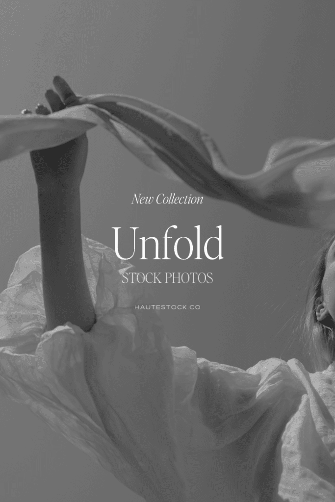 Grayscale cover reading “Unfold Stock Photos” by Haute Stock. Featuring woman and over flowing sheer sleeves with soft, elegant light.