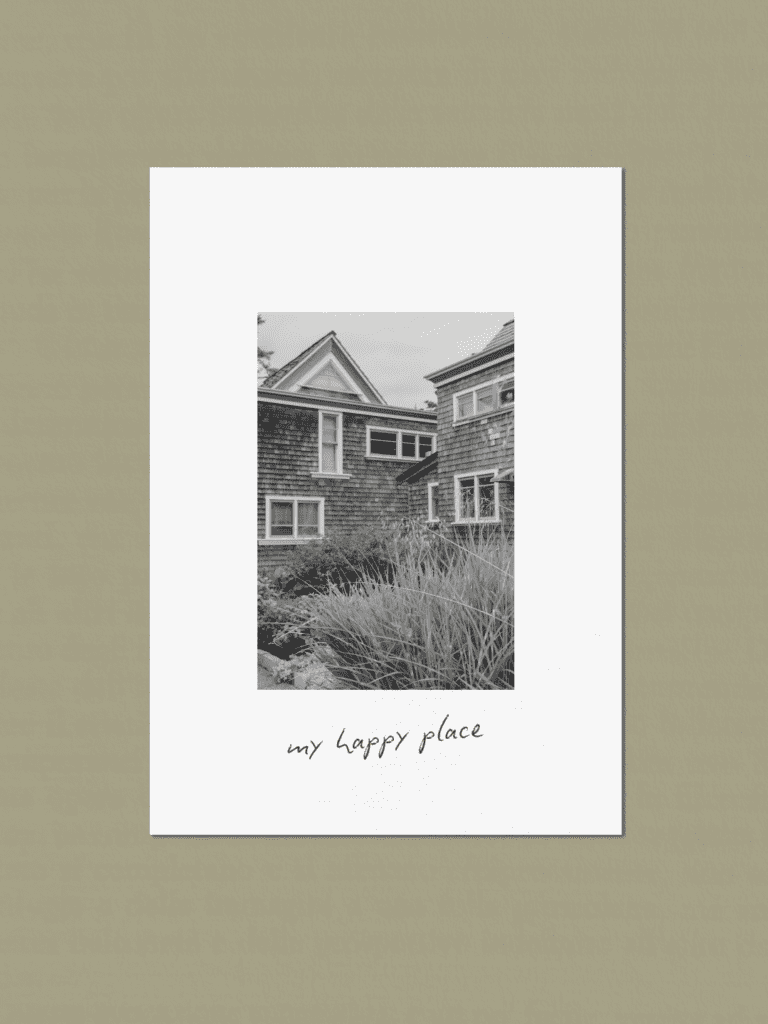 Rustic countryside cottage home surrounded by natural garden landscape in cottagecore style. 